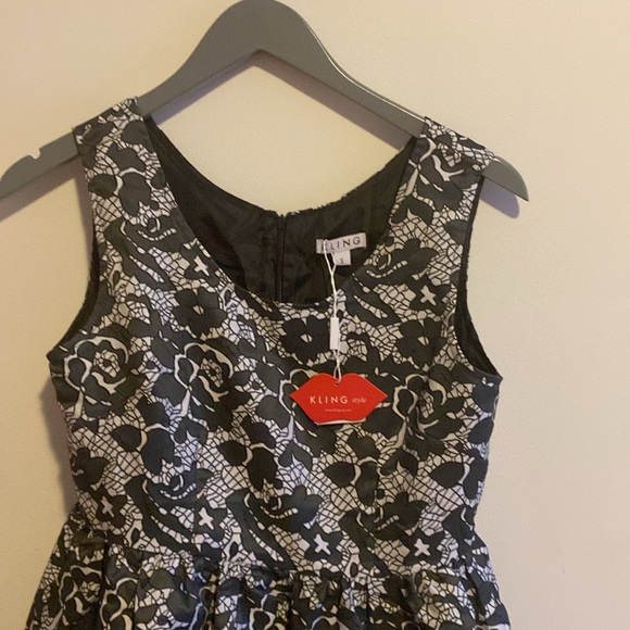 Nice and classy midi dress, with a crinoline under thé main dress, new with tag - Picture 3 of 5